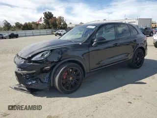 2017 Porsche Cayenne Turbo with VIN WP1AC2A2XHLA92055, listed as a Copart auction lot 52610555 with 82,224 mi miles and Salvage title. Bid and sale history available at DreamBid. Image 1.