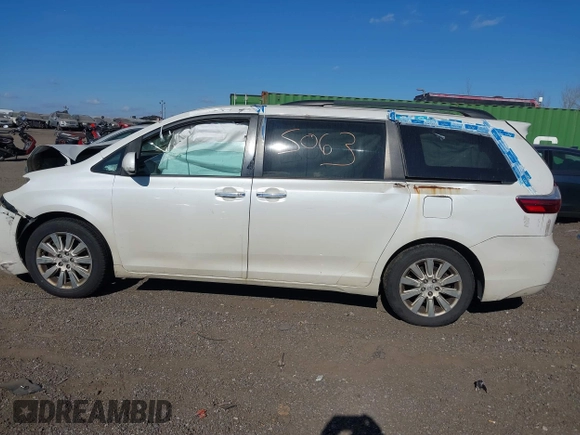 2015 Toyota Sienna Limited z VIN 5TDDK3DC4FS101226, wystawiony jako IAAI lot #40755063 z przebiegiem 153 793 mil mil oraz . Historia ofert i sprzedaży dostępna na DreamBid. Obrazek 14.