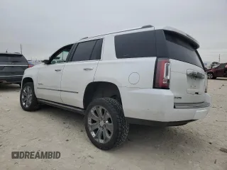 2016 GMC Yukon Denali with VIN 1GKS2CKJ8GR271098, listed as a Copart auction lot 42983315 with 109,582 mi miles and Salvage Title. Bid and sale history available at carsss.com. Image 2.