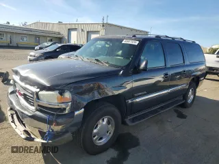 2003 GMC Yukon XL SLT with VIN 3GKFK16T03G303389, listed as a Copart auction lot 86987924 with 134,516 mi miles and Salvage Title. Bid and sale history available at carsss.com. Image 1.