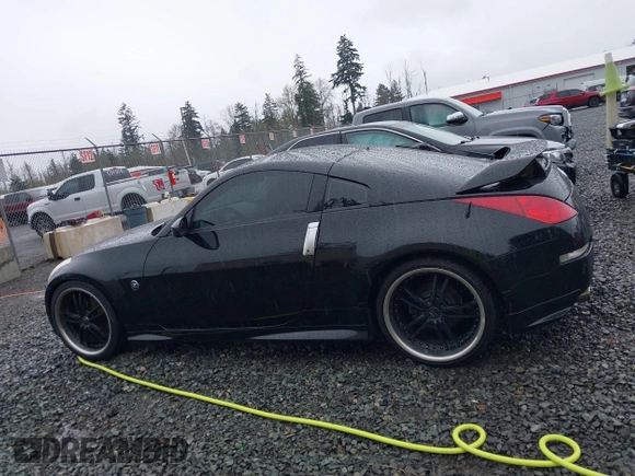 2003 Nissan 350Z Touring with VIN JN1AZ34EX3T013345, listed as a IAAI auction lot 41984329 with 102,115 mi miles. Bid and sale history available at carsss.com. Image 14.