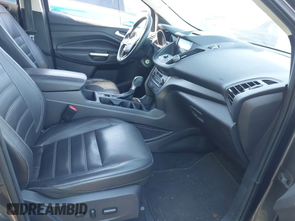 2017 Ford Escape SE z VIN 1FMCU0GDXHUB66813, wystawiony jako IAAI lot #42056150 z przebiegiem 86 915 mil mil oraz . Historia ofert i sprzedaży dostępna na DreamBid. Obrazek 5.