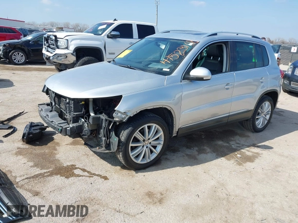 2013 Volkswagen Tiguan SE with VIN WVGAV7AX4DW545658, listed as a IAAI auction lot 41523168 with 188,729 mi miles and . Bid and sale history available at DreamBid. Image 18.
