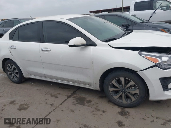 2023 Kia Rio S z VIN 3KPA24AD3PE542301, wystawiony jako IAAI lot #41364553 z przebiegiem 35 204 mil mil oraz . Historia ofert i sprzedaży dostępna na DreamBid. Obrazek 13.