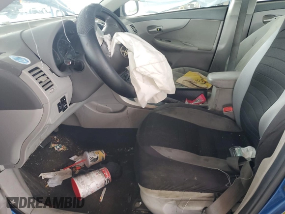 2010 Toyota Corolla with VIN 2T1BU4EE1AC388288, listed as a Copart auction lot 60653525 with 152,969 mi miles and Salvage title. Bid and sale history available at DreamBid. Image 7.