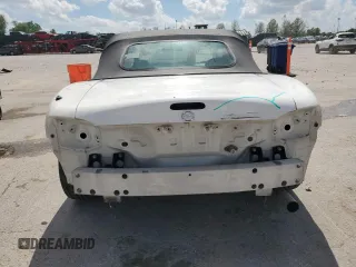 2000 Mazda MX-5 Miata with VIN JM1NB3531Y0152594, listed as a Copart auction lot 57460195 with 78,139 mi miles and Salvage title. Bid and sale history available at DreamBid. Image 6.