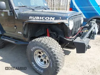 2004 Jeep Wrangler Rubicon with VIN 1J4FA69S64P789308, listed as a IAAI auction lot 41714489 with 186,302 mi miles. Bid and sale history available at carsss.com. Image 6.