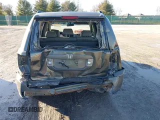 2006 Honda Pilot EX-L with VIN 5FNYF28546B002907, listed as a IAAI auction lot 41650042 with 272,069 mi miles and . Bid and sale history available at carsss.com. Image 6.