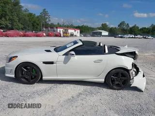2013 Mercedes-Benz SLK 250 with VIN WDDPK4HA2DF056625, listed as a IAAI auction lot 42343051 with 96,615 mi miles and . Bid and sale history available at DreamBid. Image 14.