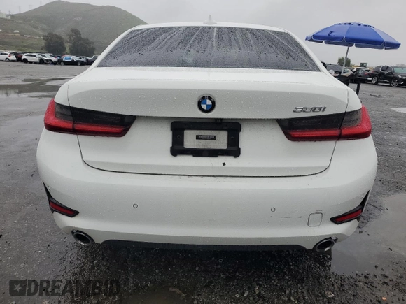 2021 BMW 3 Series 330i with VIN 3MW5R1J0XM8B48990, listed as a Copart auction lot 49277185 with 69,776 mi miles and Salvage Title. Bid and sale history available at carsss.com. Image 6.