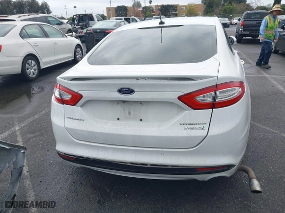 2015 Ford Fusion Titanium Hybrid with VIN 3FA6P0RU3FR247118, listed as a IAAI auction lot 41210219 with 143,348 mi miles. Bid and sale history available at carsss.com. Image 16.