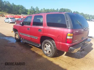 2004 Chevrolet Tahoe LS with VIN 1GNEC13V54R312043, listed as a IAAI auction lot 42036854 with 327,739 mi miles and . Bid and sale history available at DreamBid. Image 3.