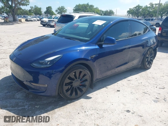 2023 Tesla Model Y Performance with VIN 7SAYGDEF9PF582908, listed as a IAAI auction lot 41930957 with 52,857 mi miles and . Bid and sale history available at DreamBid. Image 16.
