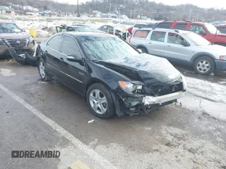 2008 Acura RL Tech Pkg with VIN JH4KB16608C001517, listed as a IAAI auction lot 41305313 with 220,509 mi miles. Bid and sale history available at carsss.com. Image 1.