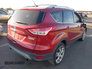 2013 Ford Escape Titanium with VIN 1FMCU0J96DUA57425, listed as a IAAI auction lot 40458653 with 121,929 mi miles. Bid and sale history available at carsss.com. Image 4.