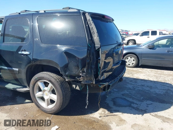 2013 Chevrolet Tahoe LTZ with VIN 1GNSKCE0XDR350970, listed as a IAAI auction lot 41704253 with 126,653 mi miles and . Bid and sale history available at DreamBid. Image 6.