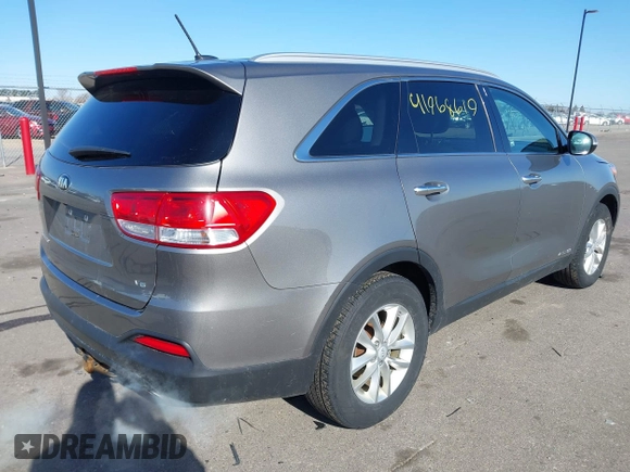 2016 Kia Sorento LX with VIN 5XYPGDA58GG178903, listed as a IAAI auction lot 41968619 with 146,853 mi miles. Bid and sale history available at carsss.com. Image 4.