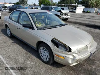 1999 Saturn SL with VIN 1G8ZK5275XZ262816, listed as a Copart auction lot 54144092 with 60,424 mi miles and Salvage title. Bid and sale history available at DreamBid. Image 1.