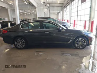 2018 BMW 5 Series 530i xDrive with VIN WBAJA7C55JWA73459, listed as a IAAI auction lot 41634921 with 64,759 mi miles and . Bid and sale history available at carsss.com. Image 13.