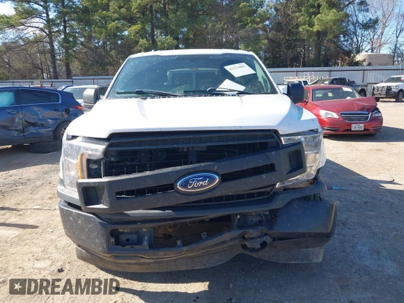 2018 Ford F-150 XL with VIN 1FTMF1CB6JKE60661, listed as a IAAI auction lot 41276885 with 142,090 mi miles. Bid and sale history available at carsss.com. Image 13.