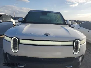 2023 Rivian R1S Adventure with VIN 7PDSGABAXPN004854, listed as a Copart auction lot 75369664 with 0 mi miles and Salvage Title. Bid and sale history available at carsss.com. Image 5.