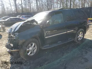 2002 GMC Envoy SLT with VIN 1GKDT13S922401408, listed as a Copart auction lot 47377005 with 0 mi miles and Salvage Title. Bid and sale history available at carsss.com. Image 1.