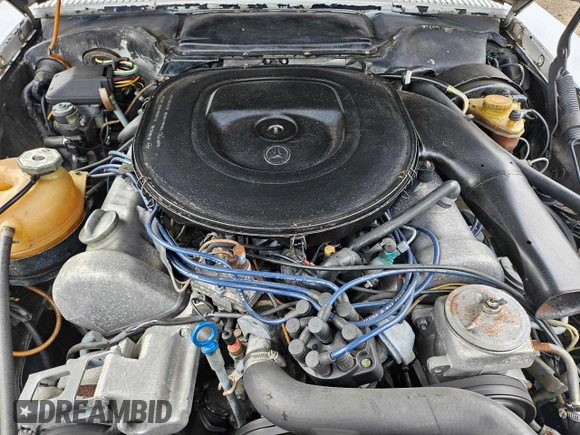 1979 Mercedes-Benz SL with VIN 10704412051659, listed as a Copart auction lot 76422164 with 106,278 mi miles and Clean title. Bid and sale history available at DreamBid. Image 7.