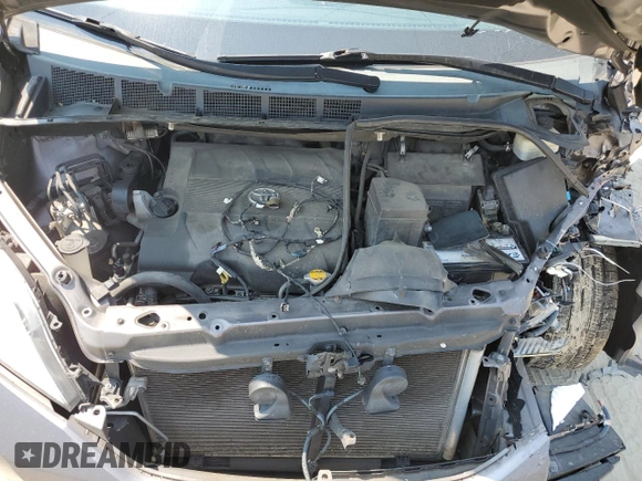 2015 Toyota Sienna LE AAS with VIN 5TDKK3DC9FS637144, listed as a Copart auction lot 59624495 with 151,681 mi miles and Salvage title. Bid and sale history available at DreamBid. Image 12.