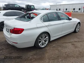 2014 BMW 5 Series 535i with VIN WBA5B1C58EDZ37186, listed as a IAAI auction lot 42040394 with 67,128 mi miles and . Bid and sale history available at DreamBid. Image 4.