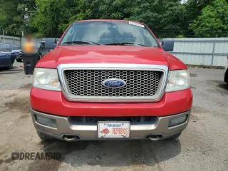 2004 Ford F-150 XLT with VIN 1FTPW14504KD65703, listed as a Copart auction lot 58792215 with 303,083 mi miles and Salvage title. Bid and sale history available at DreamBid. Image 5.