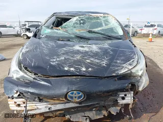 2018 Toyota Prius Two with VIN JTDKARFU7J3062094, listed as a IAAI auction lot 41648271 with 116,260 mi miles. Bid and sale history available at carsss.com. Image 13.