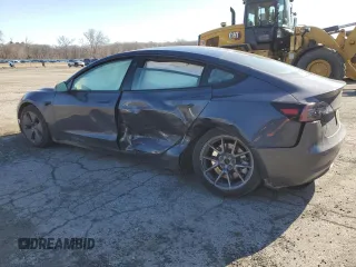 2021 Tesla Model 3 Long Range with VIN 5YJ3E1EB0MF055540, listed as a Copart auction lot 52463345 with 59,206 mi miles and Salvage Title. Bid and sale history available at DreamBid. Image 2.
