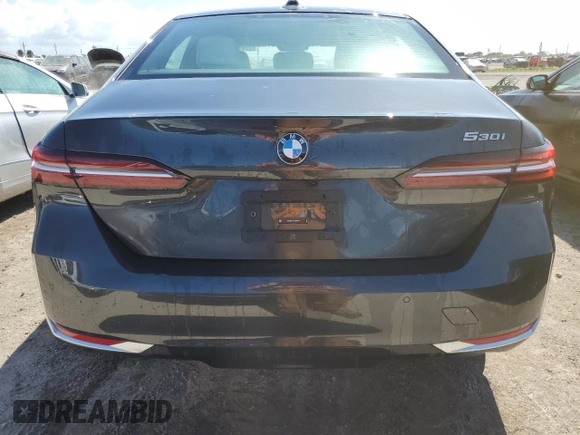 2024 BMW 5 Series 530i with VIN WBA43FJ09RCP87467, listed as a Copart auction lot 77611704 with 0 mi miles and Non Repairable. Bid and sale history available at carsss.com. Image 6.