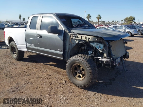 2015 Ford F-150 XL with VIN 1FTEX1CP3FKD43267, listed as a IAAI auction lot 41335186 with 137,766 mi miles. Bid and sale history available at carsss.com. Image 1.