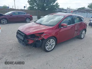 2017 Ford Focus Titanium with VIN 1FADP3N24HL294690, listed as a IAAI auction lot 39893510 with 123,089 mi miles and . Bid and sale history available at DreamBid. Image 2.