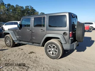 2014 Jeep Wrangler Unlimited Rubicon with VIN 1C4BJWFG4EL256824, listed as a Copart auction lot 49473815 with 117,264 mi miles and Salvage Title. Bid and sale history available at carsss.com. Image 2.