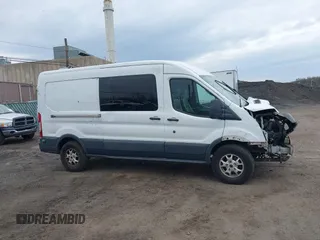 2015 Ford Transit Cargo z VIN 1FTNR2CM4FKA84584, wystawiony jako IAAI lot #42008193 z przebiegiem 224 453 mil mil oraz . Historia ofert i sprzedaży dostępna na DreamBid. Obrazek 13.