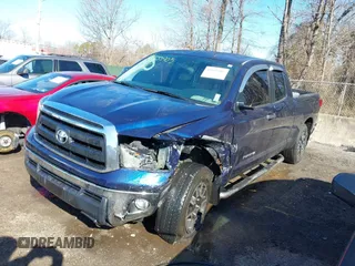 2013 Toyota Tundra z VIN 5TFUM5F14DX043076, wystawiony jako IAAI lot #41633905 z przebiegiem 157 850 mil mil oraz . Historia ofert i sprzedaży dostępna na DreamBid. Obrazek 17.