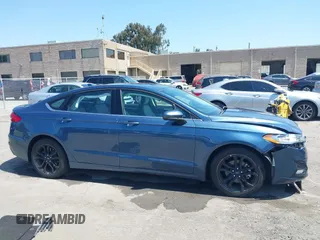 2019 Ford Fusion SE with VIN 3FA6P0HD6KR177660, listed as a IAAI auction lot 42164831 with 66,585 mi miles and . Bid and sale history available at DreamBid. Image 14.