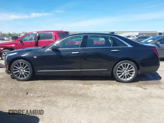 2017 Cadillac CT6 Luxury AWD z VIN 1G6KD5RS5HU133097, wystawiony jako IAAI lot #42144553 z przebiegiem 167 460 mil mil oraz . Historia ofert i sprzedaży dostępna na DreamBid. Obrazek 15.