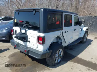 2020 Jeep Wrangler Unlimited Sahara with VIN 1C4HJXEN7LW180589, listed as a IAAI auction lot 41784143 with 58,955 mi miles. Bid and sale history available at carsss.com. Image 4.