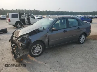2006 Ford Focus S with VIN 1FAHP34N06W115926, listed as a Copart auction lot 59145555 with 263,717 mi miles and Salvage title. Bid and sale history available at DreamBid. Image 1.