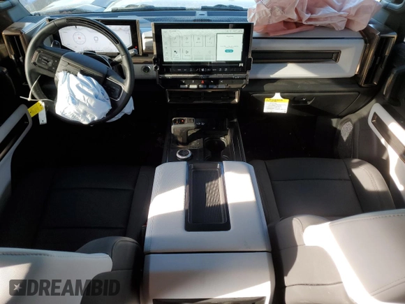 2024 GMC Hummer EV 2X z VIN 1GKB0NDE4RU104402, wystawiony jako Copart lot #88446255 z przebiegiem 15 506 mil mil oraz Szkody całkowita. Historia ofert i sprzedaży dostępna na DreamBid. Obrazek 8.
