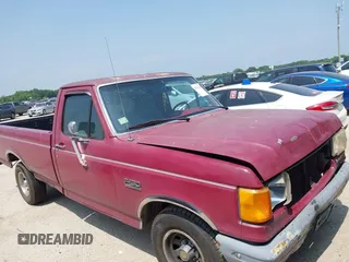 1991 Ford F-150 z VIN 1FTDF15Y4MNA93909, wystawiony jako IAAI lot #42342188 z przebiegiem 7 717 mil mil oraz . Historia ofert i sprzedaży dostępna na DreamBid. Obrazek 1.
