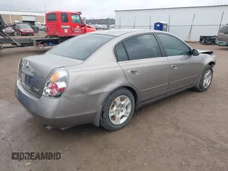 2003 Nissan Altima S z VIN 1N4AL11D53C347450, wystawiony jako IAAI lot #41523818 z przebiegiem 75 885 mil mil oraz . Historia ofert i sprzedaży dostępna na DreamBid. Obrazek 4.