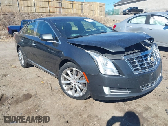 2013 Cadillac XTS Luxury with VIN 2G61R5S32D9223380, listed as a IAAI auction lot 41881602 with 335,780 mi miles. Bid and sale history available at carsss.com. Image 1.