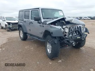 2016 Jeep Wrangler Unlimited Willys Wheeler z VIN 1C4BJWDG8GL319168, wystawiony jako IAAI lot #42385999 z przebiegiem 142 359 mil mil oraz . Historia ofert i sprzedaży dostępna na DreamBid. Obrazek 1.