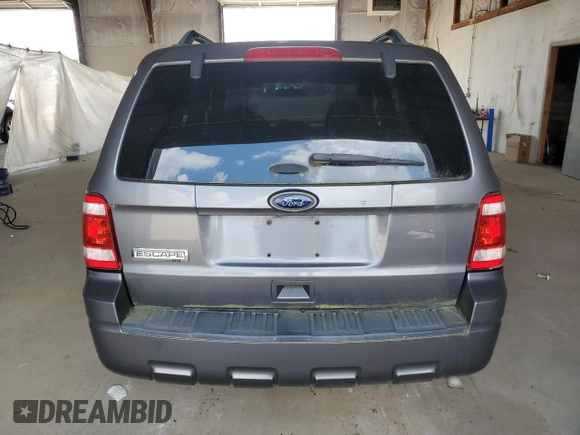 2011 Ford Escape XLT z VIN 1FMCU9D79BKB11405, wystawiony jako Copart lot #63095365 z przebiegiem Nie podano mil oraz Czysty tytuł • Clean title. Historia ofert i sprzedaży dostępna na DreamBid. Obrazek 6.