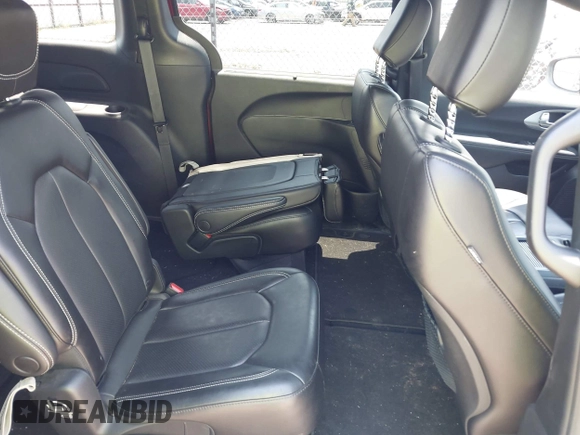 2023 Chrysler Pacifica Touring L with VIN 2C4RC1BG7PR513017, listed as a IAAI auction lot 42441272 with 23,310 mi miles and . Bid and sale history available at DreamBid. Image 8.