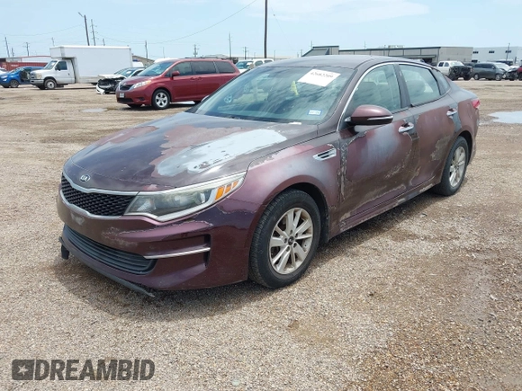 2016 Kia Optima LX with VIN 5XXGT4L32GG018768, listed as a IAAI auction lot 42682209 with 131,951 mi miles and . Bid and sale history available at DreamBid. Image 2.